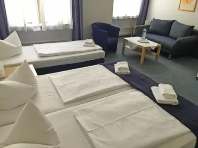 Ein Bett oder Betten in einem Zimmer der Unterkunft Hotel Seifert Berlin am Kurfürstendamm