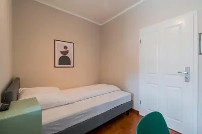 Ein Bett oder Betten in einem Zimmer der Unterkunft SUITE & APART