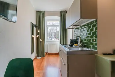 Küche/Küchenzeile in der Unterkunft SUITE & APART