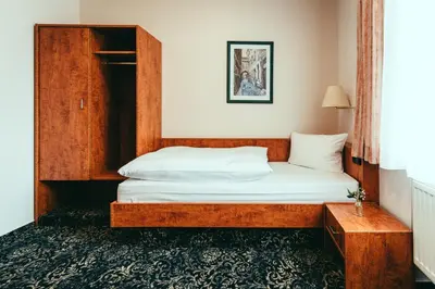 Ein Bett oder Betten in einem Zimmer der Unterkunft Landhotel Classic