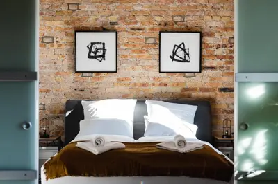 Ein Bett oder Betten in einem Zimmer der Unterkunft Luxurious Urban Living - Premium Downtown Apartments next to HBF