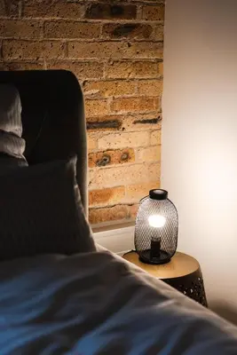 Ein Bett oder Betten in einem Zimmer der Unterkunft Luxurious Urban Living - Premium Downtown Apartments next to HBF