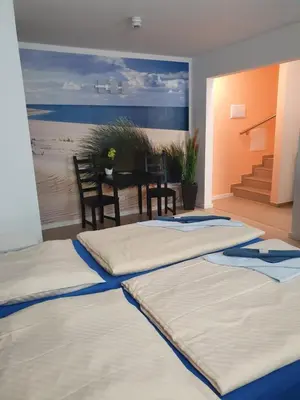 Ein Bett oder Betten in einem Zimmer der Unterkunft Pension zum Lichtenberger