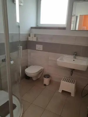 Ein Badezimmer in der Unterkunft Pension zum Lichtenberger