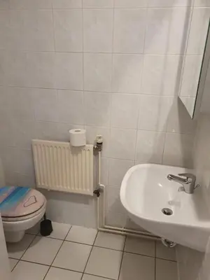 Ein Badezimmer in der Unterkunft Pension zum Lichtenberger