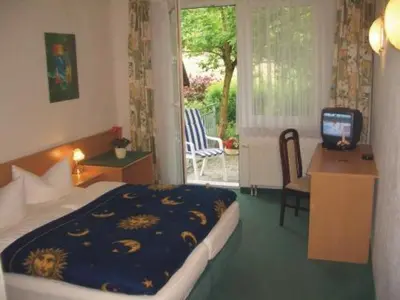 Ein Bett oder Betten in einem Zimmer der Unterkunft Waldhaus Mühlenbeck bei Berlin