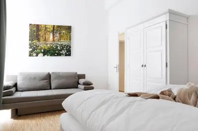Ein Sitzbereich in der Unterkunft SC 06 by ROCKCHAIR Apartments l SUPERHOST Status l 4 Bedrooms Boxspringbeds 2 Bathrooms Balcony Elevator - Cozy Family & Business Flair welcomes you!