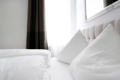 Ein Bett oder Betten in einem Zimmer der Unterkunft SC 06 by ROCKCHAIR Apartments l SUPERHOST Status l 4 Bedrooms Boxspringbeds 2 Bathrooms Balcony Elevator - Cozy Family & Business Flair welcomes you!