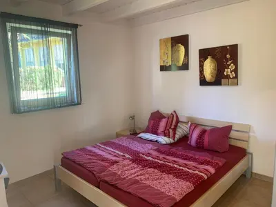 Ein Bett oder Betten in einem Zimmer der Unterkunft Bungalow in Werder am Glindower See