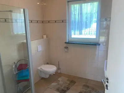 Ein Badezimmer in der Unterkunft Bungalow in Werder am Glindower See