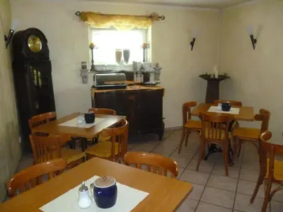 Ein Restaurant oder anderes Speiselokal in der Unterkunft Pension Haus Bielke