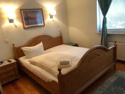 Ein Bett oder Betten in einem Zimmer der Unterkunft Pension Haus Bielke