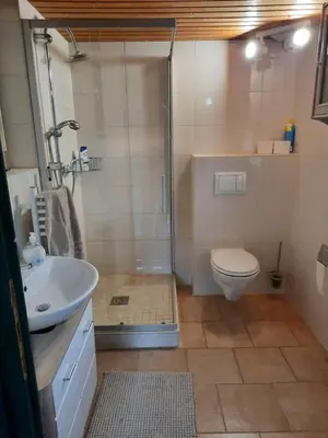 Ein Badezimmer in der Unterkunft Ferienhaus Eichenblatt