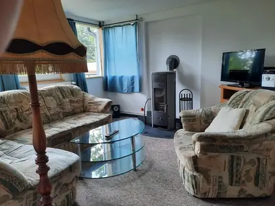 Ein Sitzbereich in der Unterkunft Ferienhaus Eichenblatt