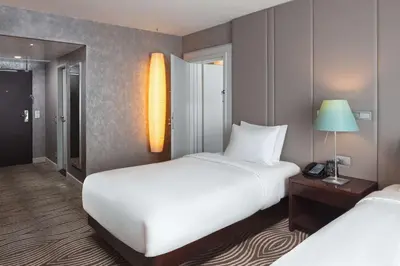 Ein Bett oder Betten in einem Zimmer der Unterkunft Hilton Berlin