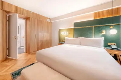 Ein Bett oder Betten in einem Zimmer der Unterkunft Hilton Berlin
