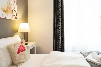 Ein Bett oder Betten in einem Zimmer der Unterkunft Big City Aprtment in Berlin-Friedrichshain