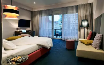 Ein Bett oder Betten in einem Zimmer der Unterkunft Hotel Neuer Fritz