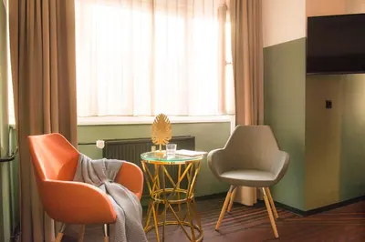 Ein Sitzbereich in der Unterkunft Hotel Neuer Fritz