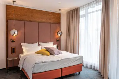 Ein Bett oder Betten in einem Zimmer der Unterkunft Hotel Neuer Fritz