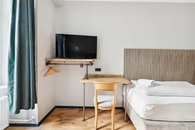 Ein Bett oder Betten in einem Zimmer der Unterkunft Hotel Comenius