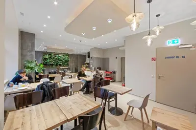 Ein Restaurant oder anderes Speiselokal in der Unterkunft Hotel Comenius