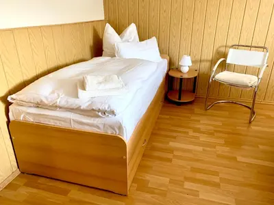 Ein Bett oder Betten in einem Zimmer der Unterkunft Ferienwohnung Fürstenwalde Spree