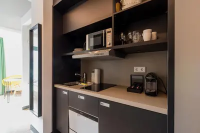 Küche/Küchenzeile in der Unterkunft Homaris Kreuzberg 61