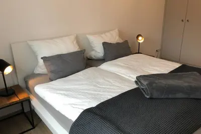 Ein Bett oder Betten in einem Zimmer der Unterkunft Dock 2 apartment