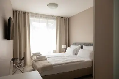 Ein Bett oder Betten in einem Zimmer der Unterkunft Hotel Pankow