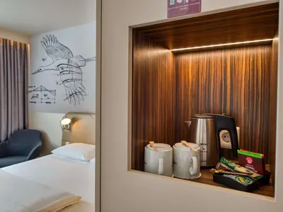 Ein Bett oder Betten in einem Zimmer der Unterkunft Mercure Hotel Berlin City