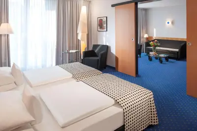 Ein Bett oder Betten in einem Zimmer der Unterkunft Dorint Hotel Potsdam