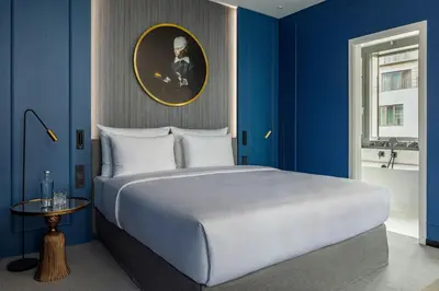 Ein Bett oder Betten in einem Zimmer der Unterkunft Hotel Luc, Autograph Collection