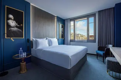 Ein Bett oder Betten in einem Zimmer der Unterkunft Hotel Luc, Autograph Collection