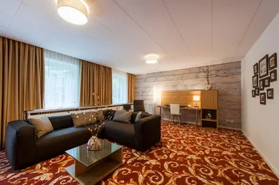 Ein Sitzbereich in der Unterkunft Ringhotel Schorfheide I Waldresort Werbellinsee