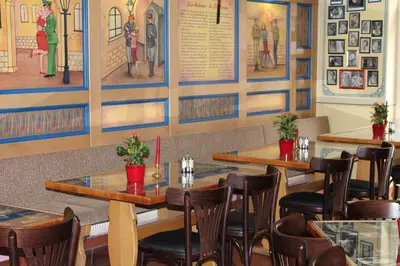 Ein Restaurant oder anderes Speiselokal in der Unterkunft Filmhotel Lili Marleen Potsdam
