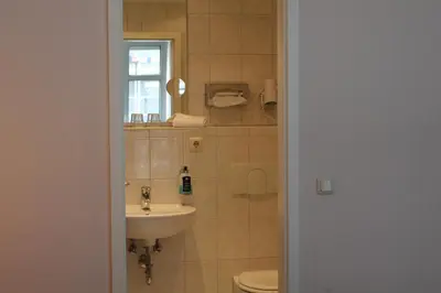 Ein Badezimmer in der Unterkunft Filmhotel Lili Marleen Potsdam