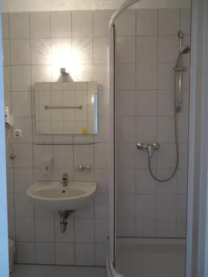 Ein Badezimmer in der Unterkunft Hotel Aster an der Messe