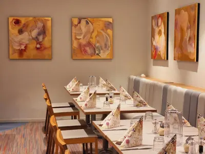 Ein Restaurant oder anderes Speiselokal in der Unterkunft Dietrich-Bonhoeffer-Hotel Berlin Mitte