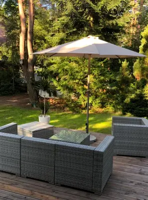 Ein Garten an der Unterkunft Ferienhaus Reetdach 1300qm Privatgrundstück Bootssteg Sauna Templin Lübbesee Uckermark Erholung pur Seenplatte