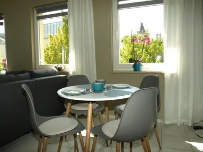 Ein Sitzbereich in der Unterkunft appartement marléne