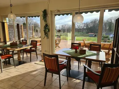 Ein Restaurant oder anderes Speiselokal in der Unterkunft Landhotel Löwenbruch