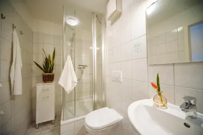 Ein Badezimmer in der Unterkunft Apartmenthaus Kaiser Friedrich