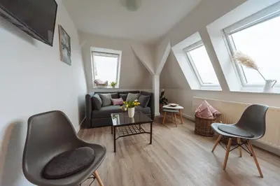 Ein Sitzbereich in der Unterkunft Apartmenthaus Kaiser Friedrich