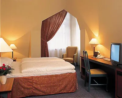 Ein Bett oder Betten in einem Zimmer der Unterkunft SORAT Hotel Brandenburg