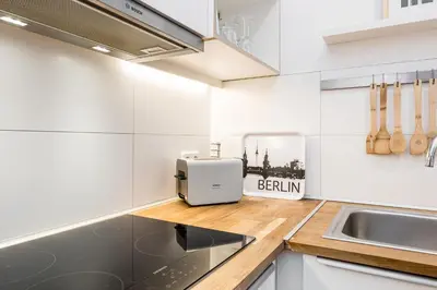 Küche/Küchenzeile in der Unterkunft Stylish New Cube Loft by Berlin-Wall-Apartments