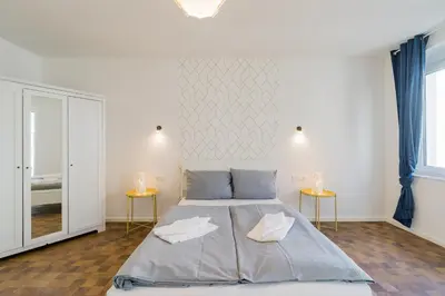 Ein Bett oder Betten in einem Zimmer der Unterkunft Nena Apartments Hermannplatz