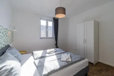 Ein Bett oder Betten in einem Zimmer der Unterkunft Nena Apartments Hermannplatz