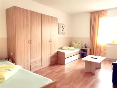 Ein Bett oder Betten in einem Zimmer der Unterkunft BOARDINGHOUSE ORANIENBURG