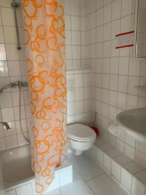 Ein Badezimmer in der Unterkunft BOARDINGHOUSE ORANIENBURG